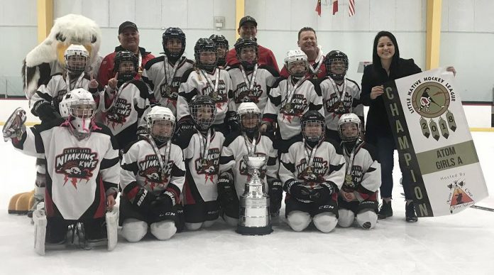 The champion Curve Lake First Nation Nimkiins Kwe (Atom Girls) team with Brigette Lacquette, the first First Nations hockey player to be named to Canada’s National Women’s Team. (Photo courtesy of Curve Lake First Nation)