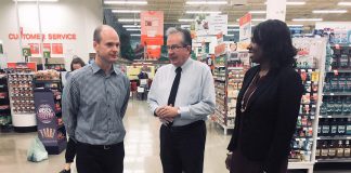 Dave Morello (left), co-owner of Morello's Independent Grocer, gave a tour of his store to Peterborough MPP Jeff Leal, Minister Responsible for Small Business, and MPP Mitzie Hunter, Minister of Advanced Education and Skills Development, at the Employing Young Talent Incentive announcement on April 3, 2018. (Photo: Paul Rellinger / kawarthaNOW.com)