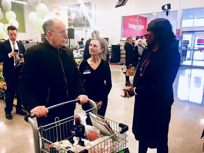 MPP Mitzie Hunter, Minister of Advanced Education and Skills Development, and Kim Morello, co-owner of Morello’s Independent Grocer, chat with a store customer at Tuesday's Employing Young Talent Incentive announcement.  (Photo: Paul Rellinger / kawarthaNOW.com)