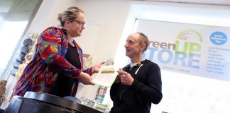 GreenUP Environmental Education Coordinator Danica Jarvis shares resources from the new "Kitchen to Compost: Too Good to Waste" program with Environmental Educator Glen Caradus. The new program will see 150 new composters installed at Peterborough residences throughout the summer of 2018 to help reduce kitchen waste from taking up unnecessary space in the local landfill. (Photo courtesy of GreenUP)