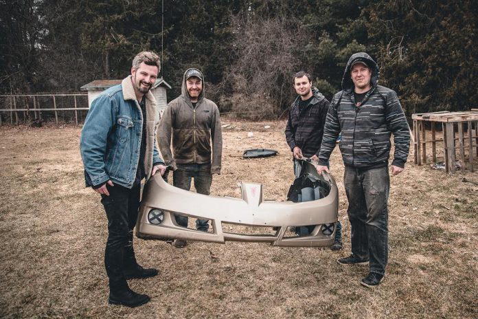 Jeremy Kelly, Tyler Junkin, Nate Mitchell, and Andy McCann are all obsessed with cars and motor sports.  (Photo: Bryan Reid)