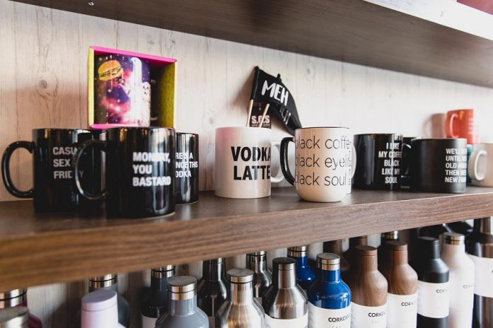 A selection of irreverent coffee mugs and Corkcicle tumblers at the new S.0.S. store at 384 George Street in downtown Peterborough. (Photo: Bryan Reid)