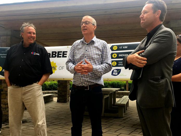 Peterborough Regional Farmers’ Network president Neil Hannam (centre), flanked by Peterborough DBIA executive director Terry Guiel and AON president and CEO Brad Smith, announced Tuesday (May 22) that the group’s new farmers’ market will be located in the Citi-Centre Courtyard off Aylmer Street between Charlotte and King streets in Peterborough. The Peterborough Regional Farmers' Market opens June 9, 2018 and will continue each Saturday morning into the fall. (Photo: Paul Rellinger / kawarthaNOW.com)