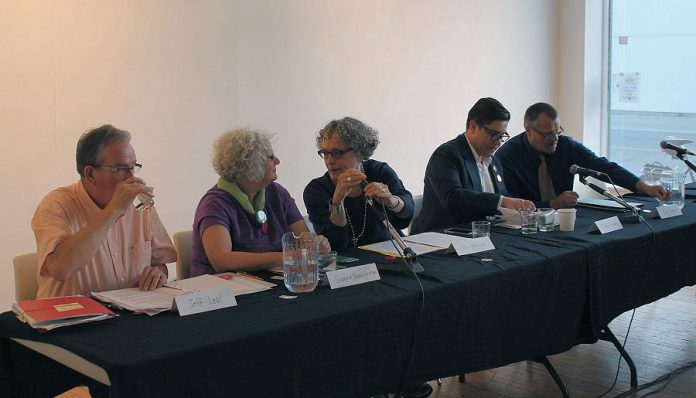 Candidates prepare to address questions moderated by Julia Harrison, President of Reframe Film Festival. Left to right: Liberal Party candidate Jeff Leal, Green Party candidate Gianne Broughton, Julia Harrison, NDP candidate Sean Conway, and Trillium Party candidate Rob Roddick.  (Photo: Amy Bowen / kawarthaNOW.com)