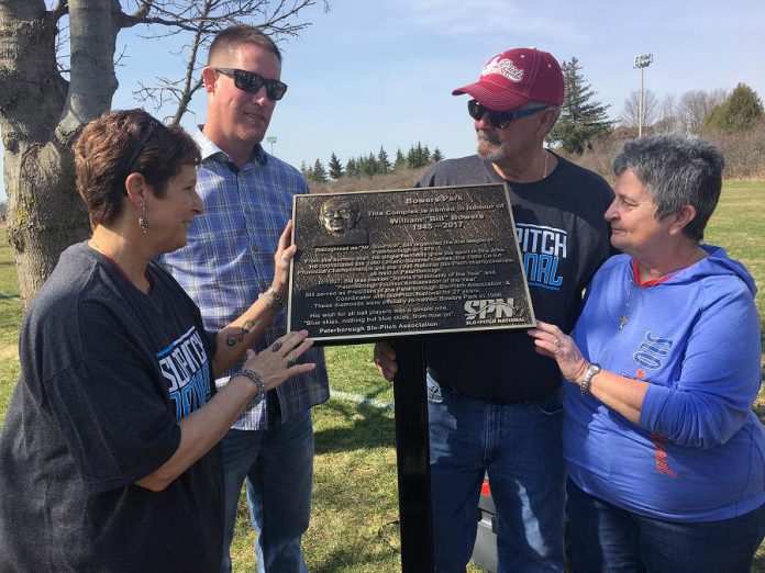 A plaque honouring the late Bill "Mr. Slo-Pitch" Bowers was unveiled Wednesday morning (May 2) in Bowers Park off Brealey Drive in Peterborough. Among those remembering Bowers' milestone contributions to the game at the local, provincial and national were (from left) City of Peterborough recreationist Terry Lynn Johnston, Bowers' son Dan (who travelled from North Dakota for the dedication), and his close friends and Peterborough Slo-Pitch Association colleagues Bob and Maureen Lewis. (Photo: Paul Rellinger / kawarthaNOW.com)