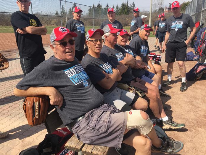 Members of the J.O. Express team prepared for a game against McMillan Sports following the Bill Bowers plaque dedication Wednesday morning (May 2) at Bowers Park off Brealey Drive. Bowers was a member of both teams at the time of his passing in July 2017. (Photo: Paul Rellinger / kawarthaNOW.com)