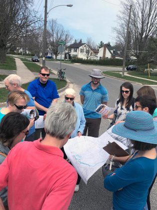 During the first week of May, residents gathered for a Jane's Walk in the Jackson Park - Brookdale neighbourhood. Attendees shared ideas about how streets and crossings in that neighbourhood could be made safer, and discussed the kinds of impacts this would have on residents' health and the social fabric of the neighbourhood. (Photo: Laura Keresztesi) 