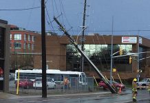 The May 4, 2018 wind storm in southern Ontario caused significant damage including downed trees, damaged roofs, and broken or leaning hydro poles, including this one at Sherbrooke and Aylmer streets in downtown Peterborough. (Photo: Wendy Gibson)