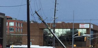 The May 4, 2018 wind storm in southern Ontario caused significant damage including downed trees, damaged roofs, and broken or leaning hydro poles, including this one at Sherbrooke and Aylmer streets in downtown Peterborough. (Photo: Wendy Gibson)