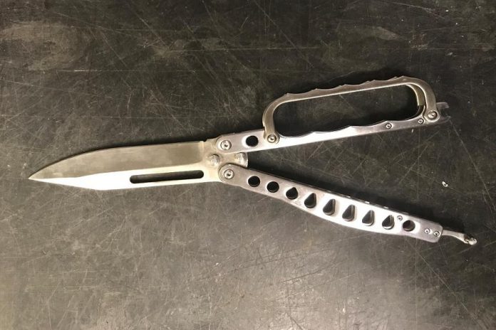 Someone surrendered this "butterfly" knife, also known as a balisong or a Batanga knife, to the City of Kawartha Lakes Police Service. The knife, which has handles that rotate to close around the blade of the knife and conceal it, is a prohibited weapon in Canada. (Photo courtesy of the City of Kawartha Lakes Police Service)