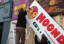 The sign at the now-closed Moondance at 425 George Street North being taken home. It will be displayed in Pappas Billiards at 407 George Street North. (Photo: Moondance Music)