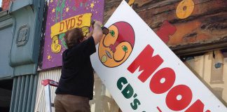 The sign at the now-closed Moondance at 425 George Street North being taken home. It will be displayed in Pappas Billiards at 407 George Street North. (Photo: Moondance Music)
