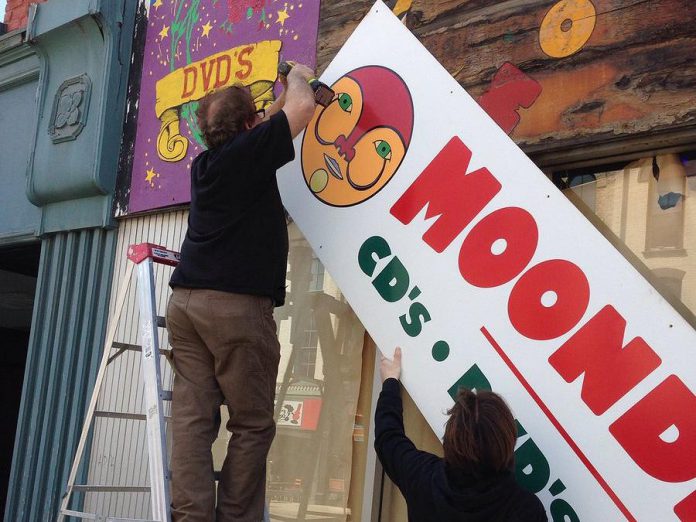 The sign at the now-closed Moondance at 425 George Street North being taken home. It will be displayed in Pappas Billiards at 407 George Street North. (Photo: Moondance Music)