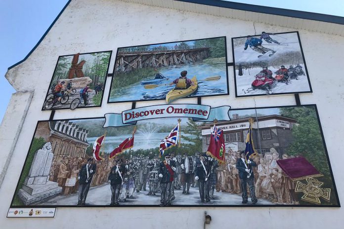 This new mural painted by artist Cliff Smith in the Village of Omemee is designed to encourage the drive-through traffic along Highway 7 to stop and explore the community. It is part of the Discover Omemee initiative, which also includes new maps and signage throughout the village. (Photo courtesy of the City of Kawartha Lakes)