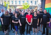 Representatives of the Peterborough DBIA, the Warming Room, the City of Peterborough, and other partners at the May 29, 2018 announcement of "One City Peterborough", a two-pronged pilot program running over the summer that will see vulnerable people hired to help clean the streets of downtown Peterborough and two full-time outreach workers to assist people downtown, particularly those facing homelessness, social exclusion, and mental health issues. (Photo: Peterborough DBIA)