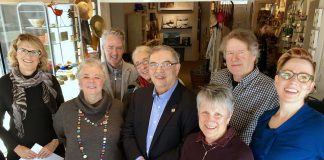 At the sold-out Mayor's Luncheon for the Arts on May 25, 2018, the inaugural Peterborough Arts Awards will be presented to recognize outstanding achievement in the arts. The awards were conceived by the late Liz Bierk and Su Ditta (second from left), championed by LLF Lawyers partner and photographer Bill Lockington (front centre), and have been sponsored over five years by (from left to right) Merit Realty Limited (represented by by Shelley Barrie), BrandHealth (represented by Paul Hickey), Kate and Alex Ramsay (represnted by Kate Ramsay, behind Bill Lockington), and Betty and Bill Morris (represented by Betty Morris). Also pictured are Bill Kimball of Public Energy (the charitable trustee for the Peterborough Arts Awards) and writer and performer Kate Story. Not pictured: sponsor Paul Bennett of Ashburnam Realty. (Photo: Tammy Thorne / kawarthaNOW.com)