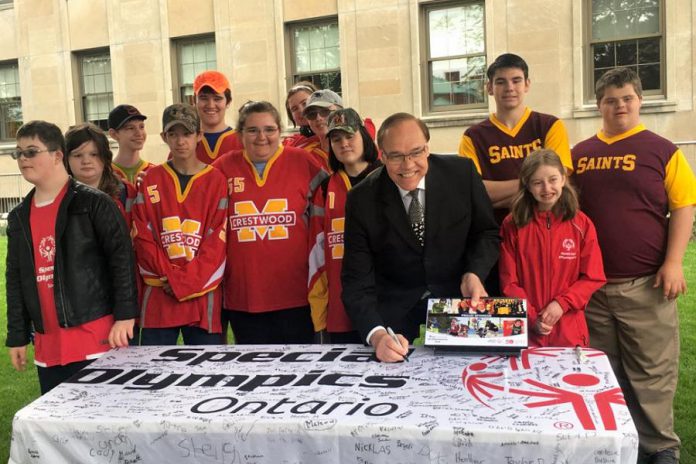 City of Peterborough Mayor Daryl Bennett with some student atheletes on Special Olympics Day in Peterborough (May 22, 2018). Hosted by the Peterborough Police Service, the 2018 Special Olympics Ontario School Championships takes place from May 29th to 31st in Peterborough. (Photo: Special Olympics Ontario)