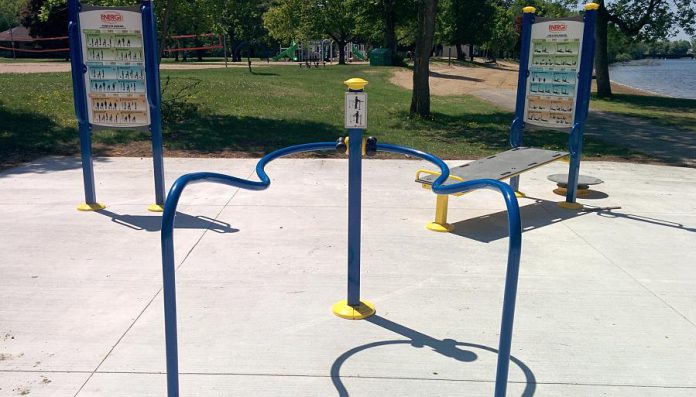 With this piece of equipment, you step into the "U", hold a slider in each hand, and then slide from sides to front. The range of motion depends on where you stand. Turn around to work the back muscles. (Photo: Bruce Head / kawarthaNOW.com)