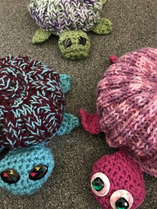 A few of the hand-knit and crocheted turtles created by Knittervention for the group's latest "yarn bomb" in Bancroft to raise awareness for the local turtle population. (Photo courtesy of Knittervention)