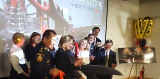 Northumberland-Peterborough South MP Kim Rudd cuts the ribbon officially opening Venture13, Cobourg's new innovation and entrepreneurship centre for Northumberland County, along with repreentatives from the Town of Cobourg, Northumberland Community Futures Development Corporation, Cobourg Police Service, Fleming College, Northumberland Makers and more. (Photo: Jeannine Taylor / kawarthaNOW.com)