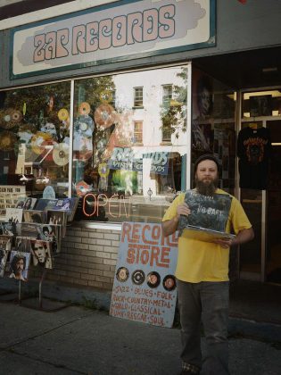 Owner Tim Horgan pictured in front of ZAP Records at its previous 14 King St. E. location. Horgan, who opened his independent record store in 1991, moved to a larger location at 45 King St. E. in 2016. He is now opening a second location in downtown Peterborough. (Photo: Ray Kies)