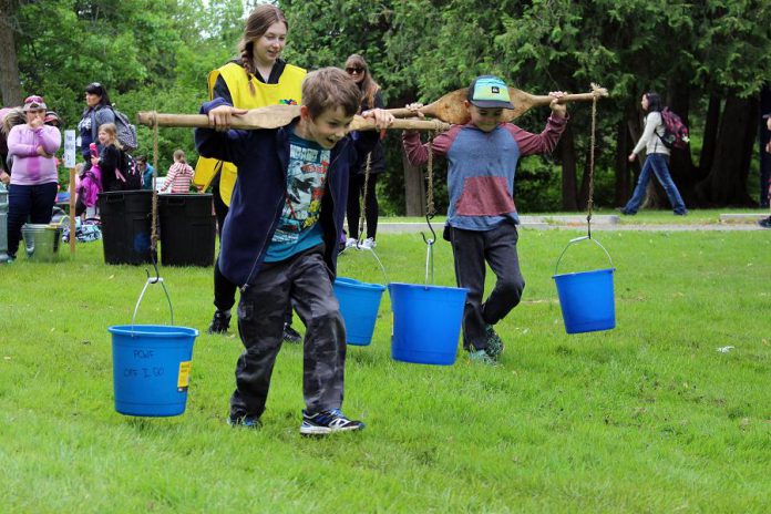 At the activity centre, Pioneer Water Race, children experience first hand, how difficult it is to carry water, and gain an appreciation for the water that we have piped directly into our homes, schools, and businesses.  (Photo: Karen Halley / GreenUP)