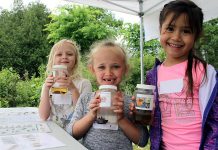 Students attending this 2018 Peterborough Children’s Water Festival hold up their favourite invertebrates. The Otonabee Conservation activity centre allows children to get up close with many aquatic bugs and insects to understand how their unique features allow them to live in water. This year's festival, which took place on June 6th and 7th, had registration numbers. (Photo: Karen Halley / GreenUP)