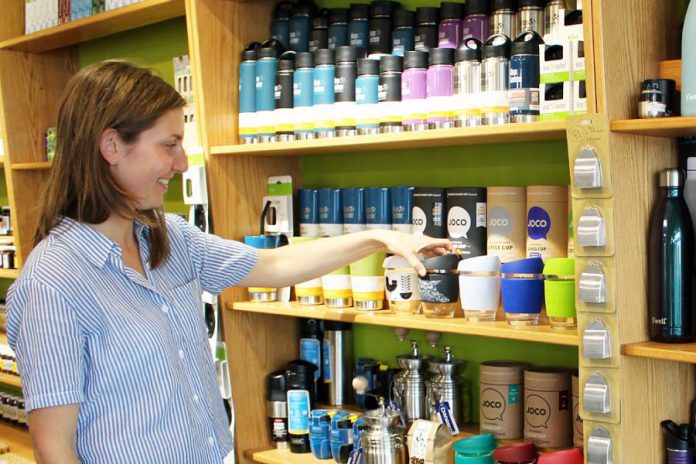 GreenUP Store Coordinator Kristen Larocque with the many non-disposable and reusable products available at the GreenUP Store to help you have a zero-waste picnic or outing. (Photo: GreenUP)