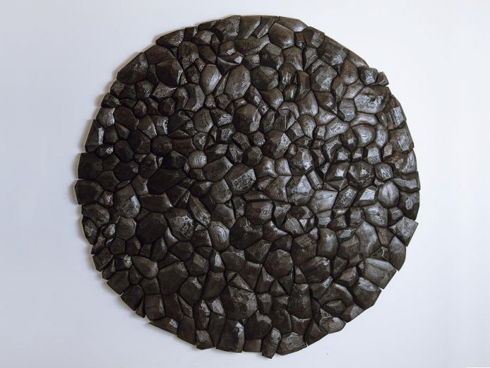 'Burnt Sun' by Rod Mireau (2015, charred wood). (Photo: by Priam Thomas, courtesy of Art Gallery of Peterborough)