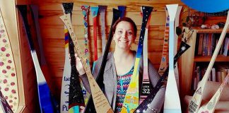Some of the 70 uniquely painted wooden canoe paddles that will soon be showcased on poles on the main streets of Bobcayeon, as part of the "Vibrant Village" efforts organized by Impact 32, a volunteer steering committee made up of local business owners and community organizers in Bobcaygeon. (Photo: Kawartha Mediums)