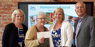 Peterborough Housing Corporation CEO Darlene Cook and Homeward Bound manager Marnie Watson receive a cheque for $20,000 from Community Foundation of Greater Peterborough board chair Diane Richard and executive director John Good. Led by Peterborough Housing Corporation, Homeward Bound helps inadequately housed or homeless mother-led families achieve self-sufficiency. (Photo: Community Foundation of Greater Peterborough)