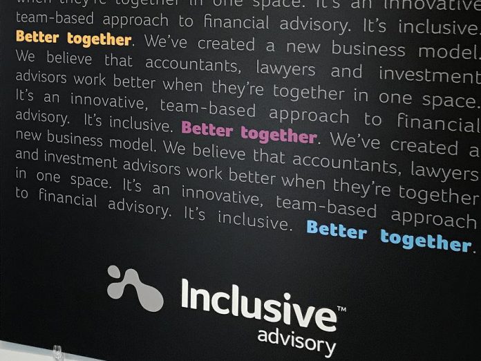 A sign on a wall at Inclusive Advisory repeats the company's mantra: "Better together. We've created a new business model. We believe that accountants, lawyers and investment advisors work better when they're together in one space. It's an innovative, team-based approach to financial advisory. It's inclusive." (Photo: Barb Shaw / kawarthaNOW.com)  