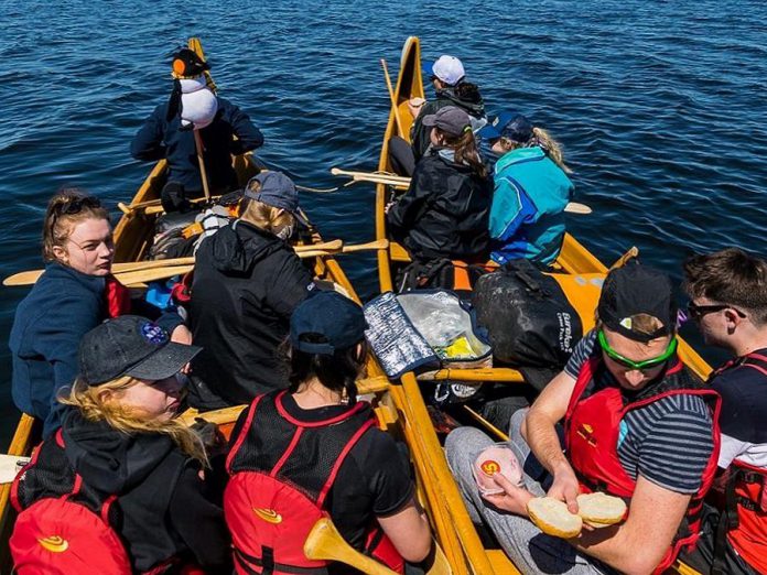 On a trip it's important to make sure your nutritional requirements are being met. That can mean stopping mid paddle for a quick snack break. (Photo: The Land Canadian Adventures)