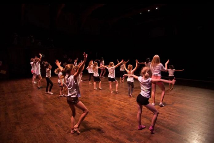 Shannon Stanlick's Triple Threat Dance Camp combines acting, signing, and dancing onstage. Children also take part in a variety of choreographed and directed musical theatre numbers. (Photo: Bradley Boyle / Market Hall Performing Arts Centre)