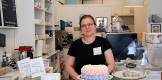 Carmela Mangos, co-owner of Sugar Dust Bakery & Cafe, and her husband George have launched a "pay-it-forward" meal program where customers can buy lunch for a person in need. Unlike similar pay-it-forward programs, the Mangoses provide customer-purchased meal vouchers to local community organizations who identify people to receive the free meal. (Photo: April Potter / kawarthaNOW.com)