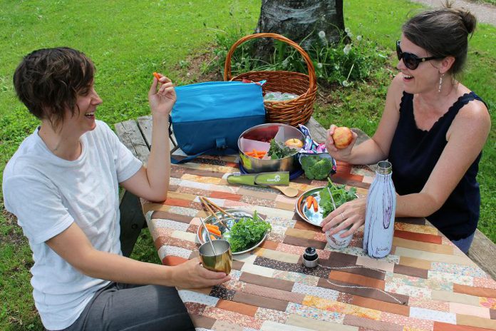 GreenUP staff enjoy a picnic at Ecology Park in Peterborough using waste-free and reusable alternatives to disposable and single-use food packing options. Stainless steel containers, water bottles, reusable drinking boxes, lunch bags, totes, and fabric snack bags -- available at the GreenUP Store -- will help you create a convenient, nutritious, and fun picnic. (Photo: Vern Bastable / GreenUP)