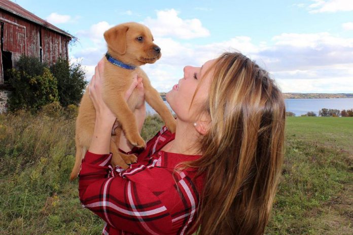 Karly Bradford, owner of online boutique Gift Farm, with her dog Rusty Muddy Paws. Bradford's new business, which had its soft launch last week, offers a curated online boutique of unique gifts. (Photo courtesy of Karly Bradford)