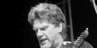 On July 6, 2018, Brian "Buzz" Thompson passed away in Toronto at the age of 68 while being treated for a heart attack and stroke. Here Buzz is pictured performing at the Dutch Mason Blues Festival in Nova Scotia. (Photo: Randy MacNeil / 2010)