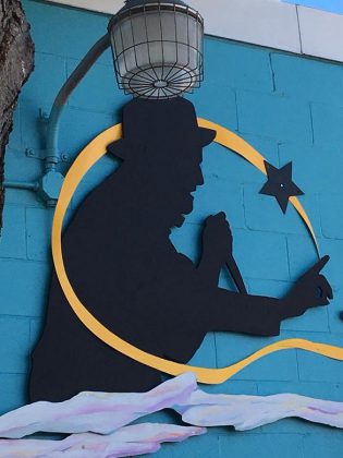 The mural pays tribute to Gord Downie of The Tragically Hip, whose 1999 song "Bobcaygeon" includes the line "It was in Bobcaygeon, I saw the constellations / Reveal themselves, one star at time". (Photo: Kawartha Coffee Co. / Facebook)