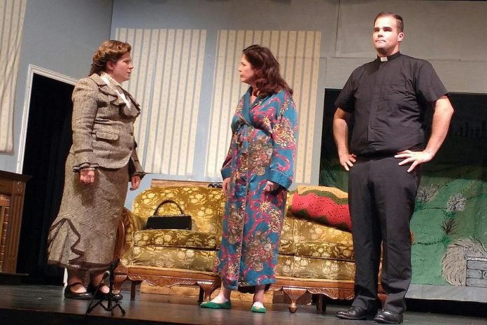 Miranda Warren as Miss Skillon, Sharon Drew as Penelope Toop, and Dylan Robichaud as Reverend Lionel Toop in "See How They Run", a fundraiser for Little Lindsay Theatre taking place on July 20 and 21, 2018 at the Academy Theatre in Lindsay. (Photo: Sam Tweedle / kawarthaNOW)