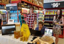 Nathan Clifford (left) of Green Improvements is developing a computer-based system to enable beekeepers to monitor the health of their hives. Nathan is one of nine young entrepreneurs participating in this year's Summer Company program in the Kawarthas, an Ontario government program administered locally through the Peterborough & the Kawarthas Business Advisory Centre. A showcase of the student-run companies was held at Staples in Peterborough as part of the province-wide Summer Company-Staples Youth Entrepreneurship Day on July 4, 2018. (Photo: Amy Bowen / kawarthaNOW.com)