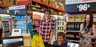 Nathan Clifford (left) of Green Improvements is developing a computer-based system to enable beekeepers to monitor the health of their hives. Nathan is one of nine young entrepreneurs participating in this year's Summer Company program in the Kawarthas, an Ontario government program administered locally through the Peterborough & the Kawarthas Business Advisory Centre. A showcase of the student-run companies was held at Staples in Peterborough as part of the province-wide Summer Company-Staples Youth Entrepreneurship Day on July 4, 2018. (Photo: Amy Bowen / kawarthaNOW.com)