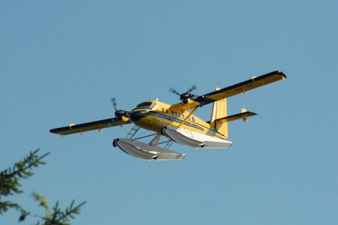 The water bomber on approach to Balsam Lake to collect a load of water. (Photo courtesy of Dean Nighswander)