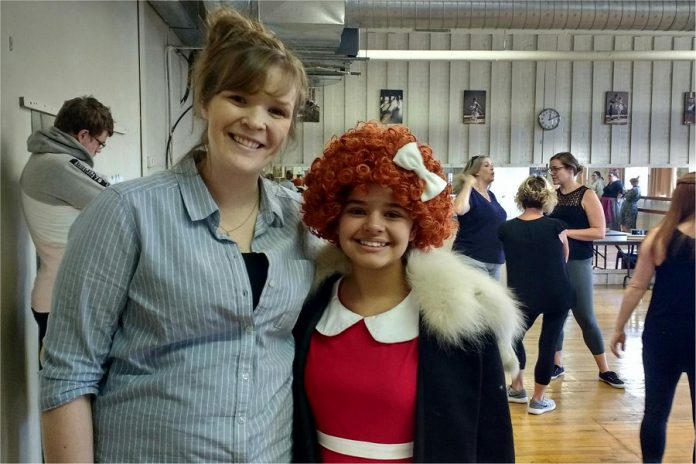 Director Claire Imrie with Gracie Silveira during a rehearsal for "Annie: The Musical". Gracie stars in the lead role of the Triple Threat Theatre production, which runs for four performances at the Academy Theatre for Performing Arts in Lindsay from August 16 to 19, 2018. (Photo: Sam Tweedle / kawarthaNOW.com)