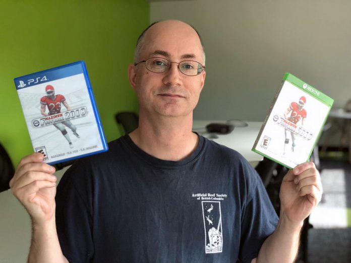 David A. Winter, president of Peterborough-based video game studio Canuck Play, with Maximum Football 2018, which has been certified for and officially released on both the PS4 and Xbox One video game platforms. (Photo courtesy of the Innovation Cluster)
