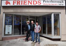 Musician Washboard Hank, David Fisher, and musician Pete Gauthier in front of FRIENDS Peterborough at 283 George Street North in downtown Peterborough. The two musicians have organized a benefit concert on Sunday, August 26th at Del Crary Park to raise funds for FRIENDS Peterborough, a Christian-based agency that provides support and assistance for people who are homeless or marginalized. (Photo: Markus Maar)