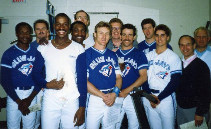 David Fisher of FRIENDS Peterborough was chaplain for the Toronto Blue Jays for 29 years, pictured here (seventh from left) in the weight room  at Exhibition Stadium (where chapel services were held) along with Tony Fernandez, David Wells, Fred McGriff, Lloyd Moseby, Kelly Gruber, and more. (Photo: David Fisher / Facebook)
