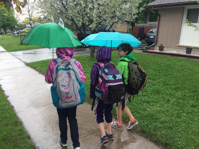 Planning ahead for the weather means that a walk, bike, or scooter ride to school can be fun for kids! Students who use active means to get to school report that they feel good after their trip to school, that they enjoy meeting up with friends along the way, and engaging in the community. (Supplied photo)