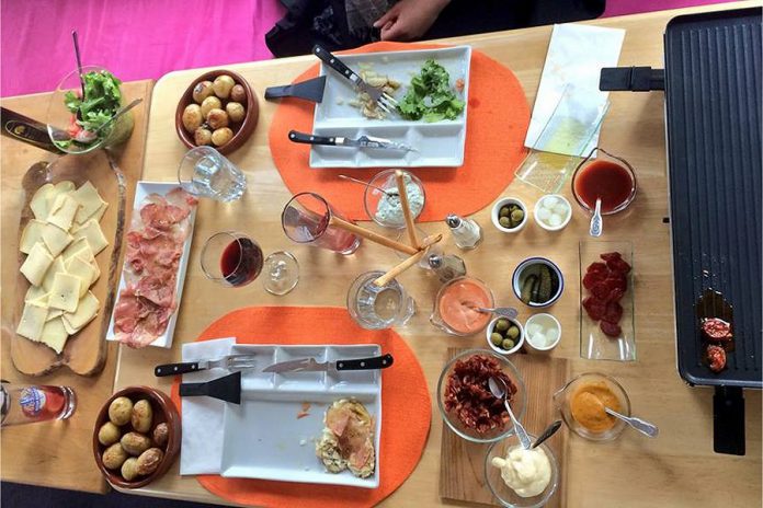 A raclette feast at Fresh Dreams, where interactive dining experience offer a chance to linger over dinner. (Photo: Fresh Dreams)