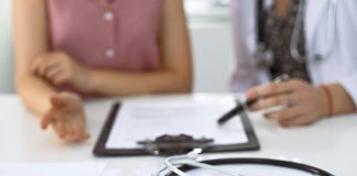 A doctor conducting a medical consultation